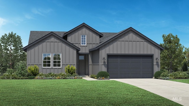 view of front of house featuring a garage and a front lawn