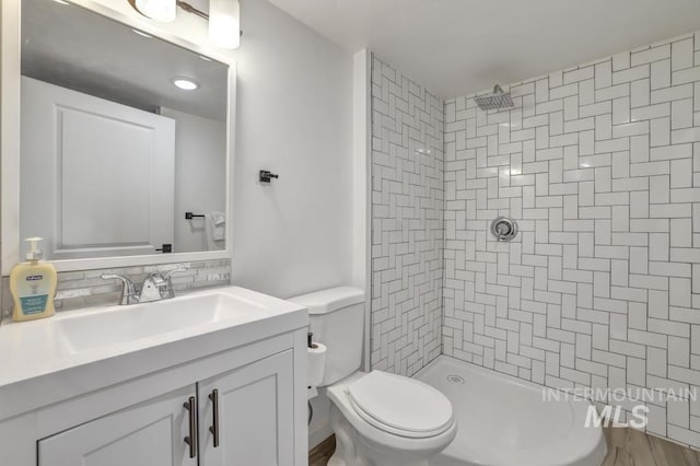 1930 Poplar Ave, Twin Falls, ID 83301 - bathroom featuring tiled shower and vanity