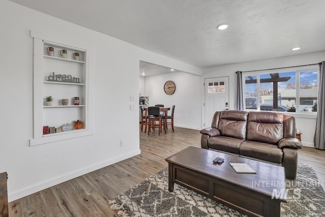 1930 Poplar Ave, Twin Falls, ID 83301 - living area with wood finished floors, built in features, and recessed lighting