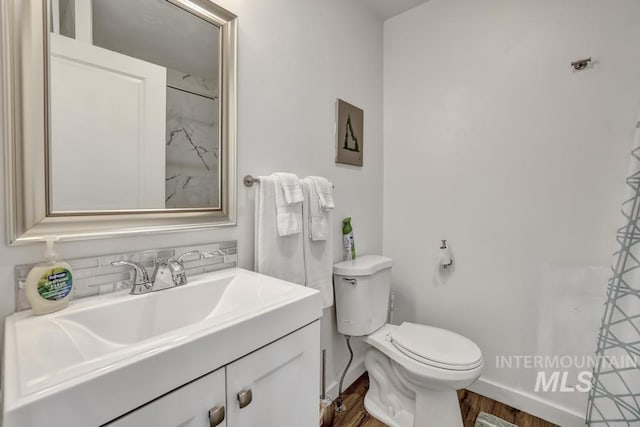 1930 Poplar Ave, Twin Falls, ID 83301 - full bath featuring vanity and wood finished floors