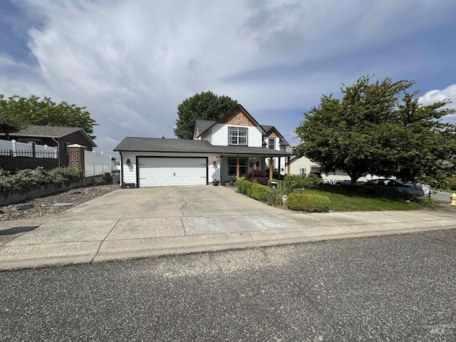 1128 30th St, Lewiston, ID 83501 - traditional-style home with an attached garage, driveway, and fence
