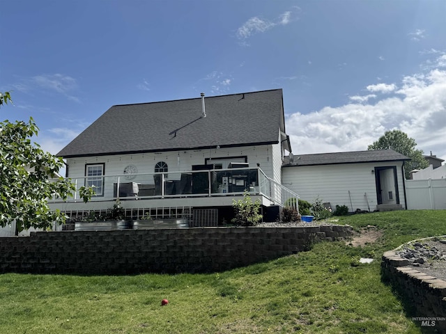 1128 30th St, Lewiston, ID 83501 - rear view of house featuring a yard and roof with shingles