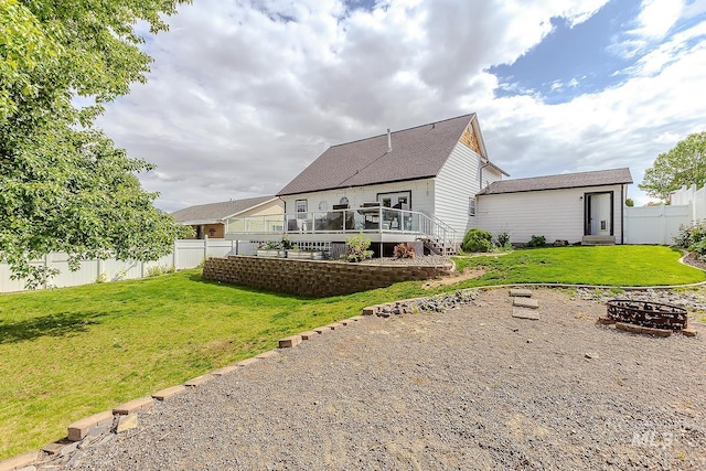 1128 30th St, Lewiston, ID 83501 - back of house featuring a deck and an outdoor fire pit