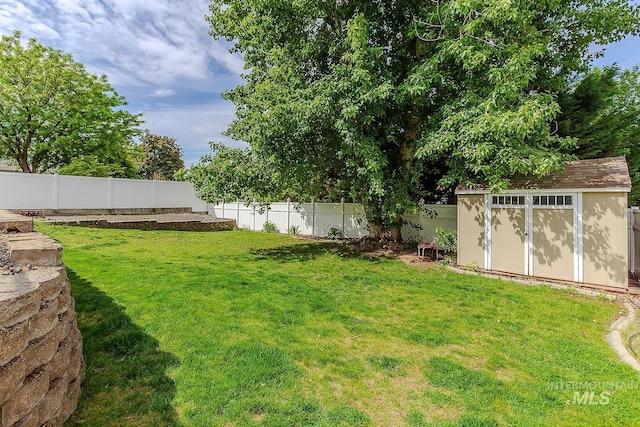1128 30th St, Lewiston, ID 83501 - view of yard featuring a storage unit and an outdoor structure
