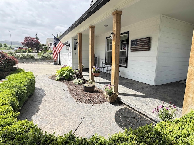 1128 30th St, Lewiston, ID 83501 - view of patio featuring covered porch and an attached garage
