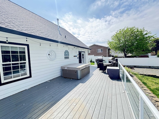 1128 30th St, Lewiston, ID 83501 - wooden deck with a hot tub and fence