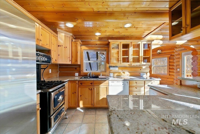 kitchen with appliances with stainless steel finishes, exhaust hood, light stone countertops, wooden ceiling, and sink