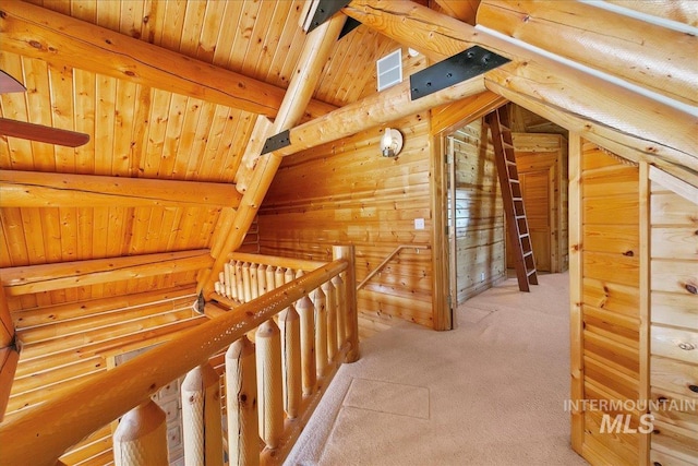 hall featuring carpet, vaulted ceiling with beams, log walls, and wood ceiling