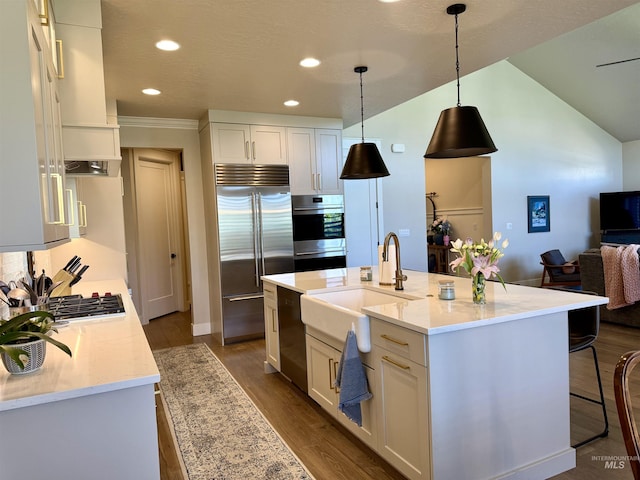 2280 N Burnam Ave, Star, ID 83669 - kitchen featuring stainless steel appliances, a sink, dark wood finished floors, white cabinetry, and recessed lighting