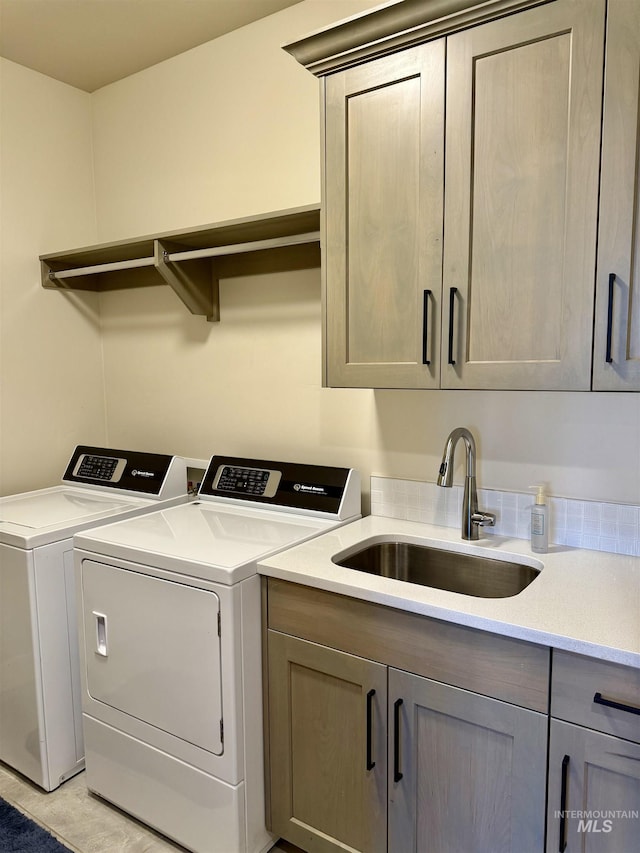 2280 N Burnam Ave, Star, ID 83669 - laundry area featuring washer and dryer and cabinet space