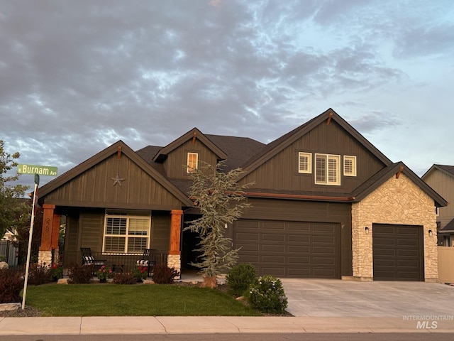 2280 N Burnam Ave, Star, ID 83669 - craftsman inspired home with stone siding, a front lawn, concrete driveway, and a garage