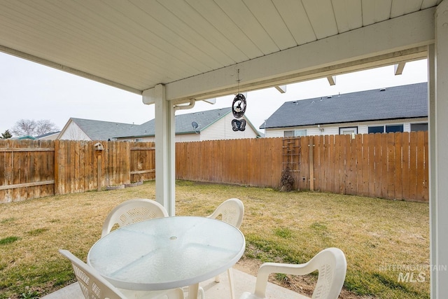 view of patio / terrace featuring outdoor dining area and a fenced backyard