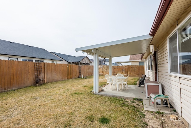 view of yard featuring a fenced backyard and a patio