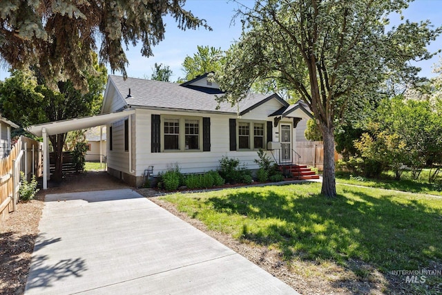 1806 N 28th St, Boise, ID 83703 - view of front of property with a shingled roof, driveway, and an attached carport