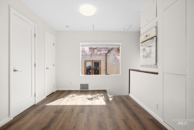 1806 N 28th St, Boise, ID 83703 - unfurnished bedroom with wood finished floors and baseboards