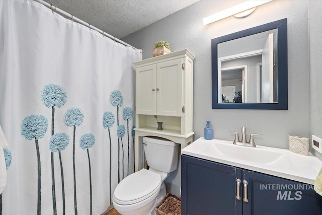 1910 E 3950 N, Filer, ID 83328 - bathroom with vanity, a textured ceiling, and a shower with curtain
