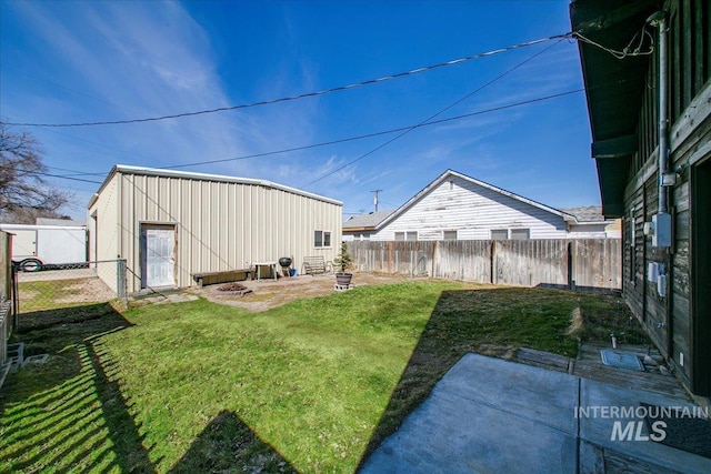 view of yard featuring a patio area and a fenced backyard