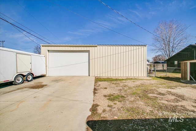 detached garage with fence