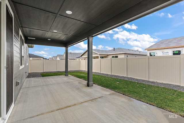 view of patio with a fenced backyard