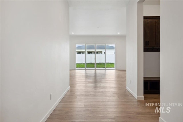 6139 W Burnt Sage Dr, Meridian, ID 83646 - corridor with recessed lighting, light wood finished floors, and baseboards