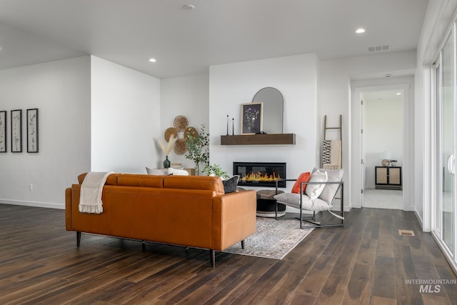 living room featuring dark hardwood / wood-style floors