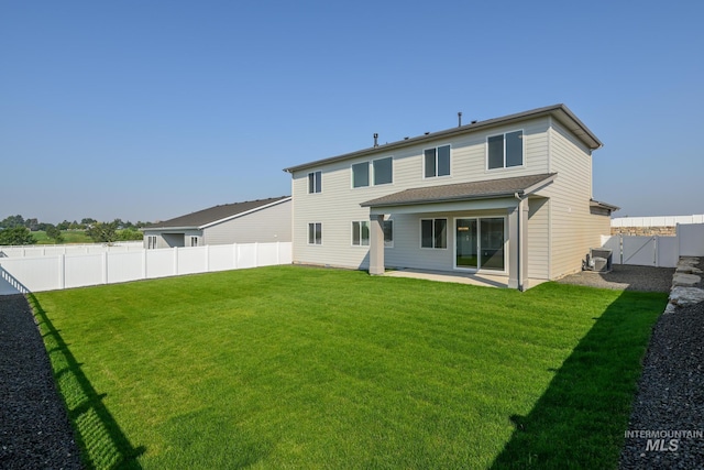 9124 W Patmore Ct, Star, ID 83669 - back of house with a patio area, central AC unit, and a gate