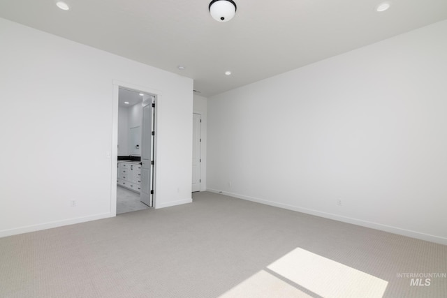 9124 W Patmore Ct, Star, ID 83669 - empty room featuring light carpet, recessed lighting, and baseboards
