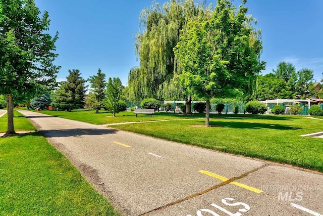 5158 S Surprise Way, Boise, ID 83716 - view of home's community with a lawn and uncovered parking