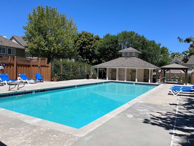 5158 S Surprise Way, Boise, ID 83716 - community pool with a gazebo, fence, and a patio area