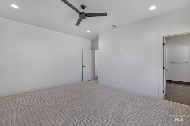 unfurnished bedroom with baseboards, carpet, and recessed lighting