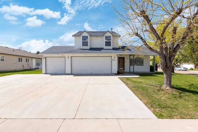traditional home with concrete driveway, a garage, and a front lawn