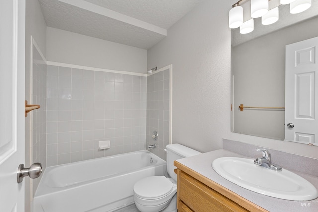 full bathroom featuring toilet, a textured ceiling, vanity, and  shower combination