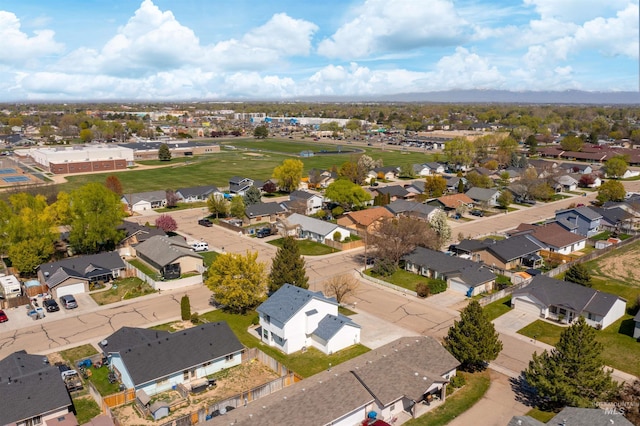 birds eye view of property with a residential view