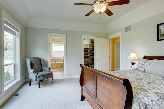 16089 N Basin Way, Boise, ID 83714 - bedroom featuring multiple windows, light colored carpet, baseboards, a spacious closet, and lofted ceiling