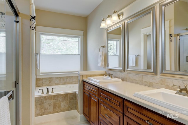 16089 N Basin Way, Boise, ID 83714 - bathroom with a tile shower, a bath, and double vanity
