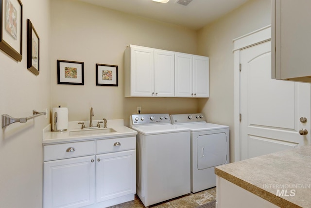 16089 N Basin Way, Boise, ID 83714 - washroom featuring separate washer and dryer and cabinet space