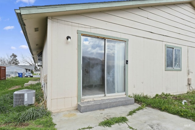 10397 10399 W Irving Ct, Boise, ID 83704 - rear view of property with central AC and entry steps