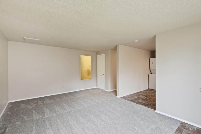 10397 10399 W Irving Ct, Boise, ID 83704 - unfurnished room featuring baseboards, carpet flooring, and a textured ceiling