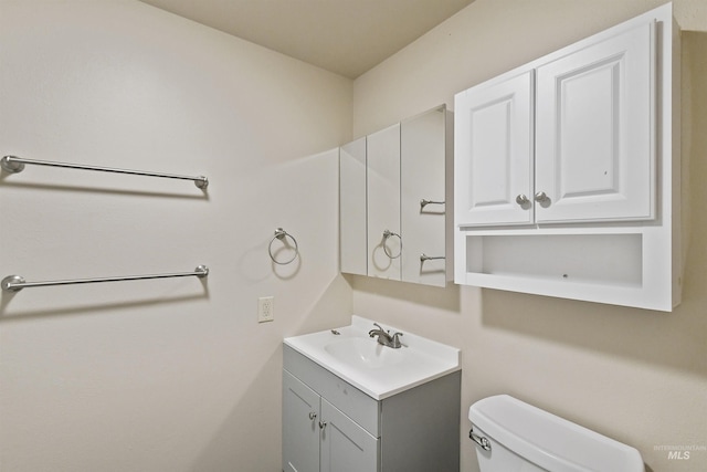 10397 10399 W Irving Ct, Boise, ID 83704 - bathroom featuring toilet and vanity