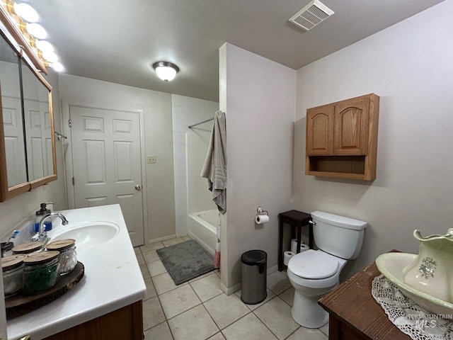 1585 Woodside Rd, Winchester, ID 83555 - full bath with tile patterned floors, vanity, toilet,  shower combination, and baseboards