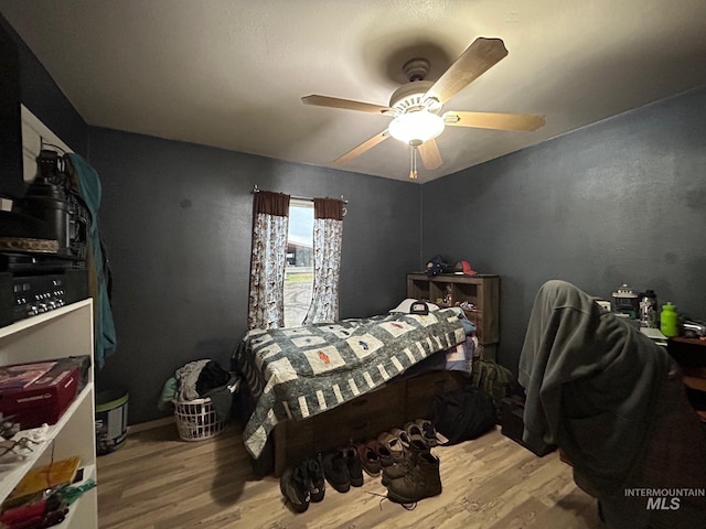 1585 Woodside Rd, Winchester, ID 83555 - bedroom featuring wood finished floors and a ceiling fan