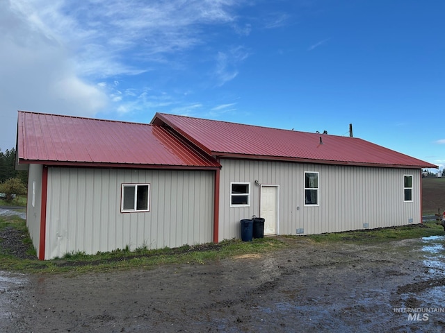 1585 Woodside Rd, Winchester, ID 83555 - back of house featuring metal roof and board and batten siding