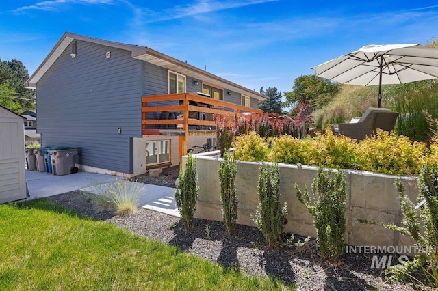 back of property with a patio area