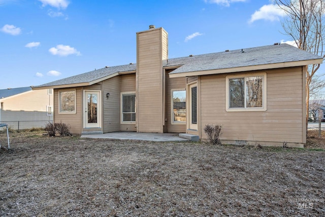 back of property featuring a patio