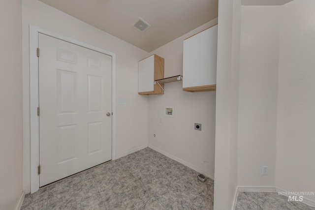 426 S Utah, Fruitland, ID 83619 - laundry room featuring hookup for an electric dryer, cabinet space, hookup for a washing machine, and baseboards
