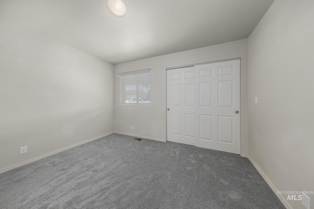 426 S Utah, Fruitland, ID 83619 - unfurnished bedroom with carpet floors, baseboards, and a closet