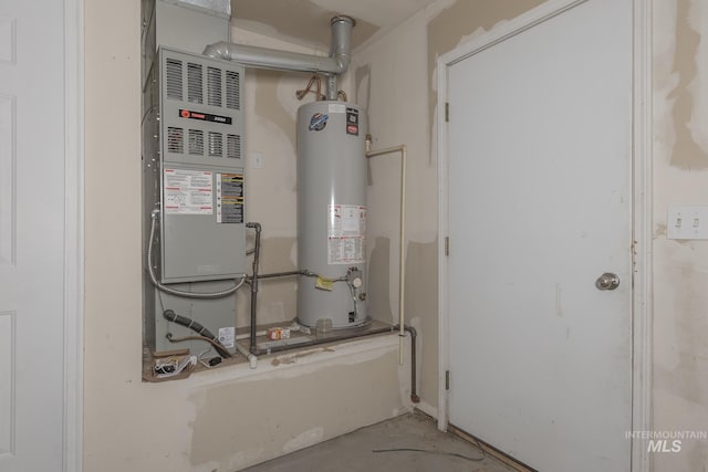 426 S Utah, Fruitland, ID 83619 - utility room featuring gas water heater and heating unit