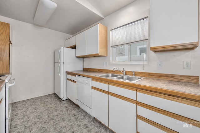 426 S Utah, Fruitland, ID 83619 - kitchen featuring a sink, white appliances, white cabinets, and light floors
