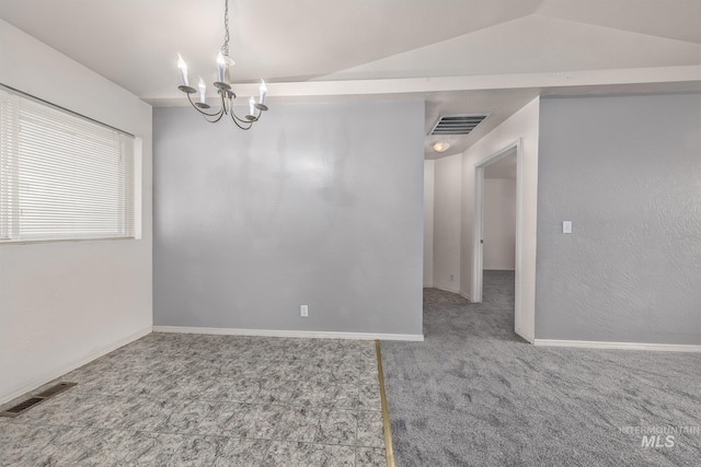 426 S Utah, Fruitland, ID 83619 - unfurnished room featuring a chandelier, lofted ceiling, and baseboards