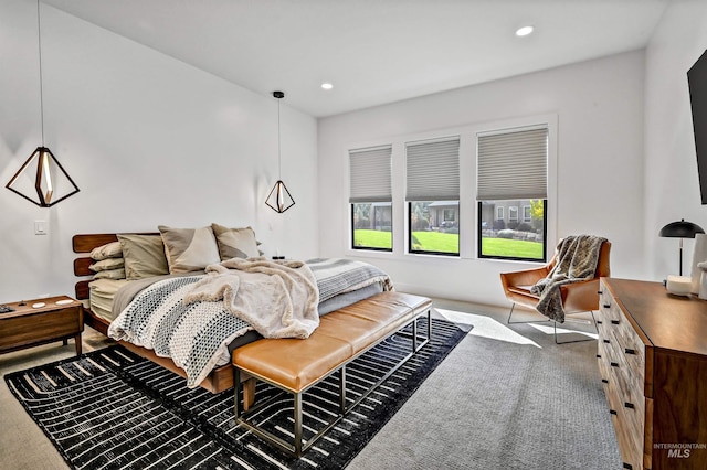 bedroom with recessed lighting and carpet